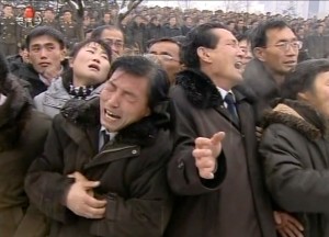 This tv grab taken from North Korean TV on December 28, 2011 shows people reacting during Kim Jong-Il's funeral at Kumsusan Memorial Palace in Pyongyang.  North Korean state television began broadcasting the funeral of late leader Kim Jong-Il December 28, with footage of tens of thousands of troops bowing their heads in the snow outside a memorial palace. EDITORS NOTE --- RESTRICTED TO EDITORIAL USE - MANDATORY CREDIT " AFP PHOTO / NORTH KOREAN TV" - NO MARKETING NO ADVERTISING CAMPAIGNS - DISTRIBUTED AS A SERVICE TO CLIENTS  AFP PHOTO/NORTH KOREAN TV NKOREA-POLITICS-FUNERAL